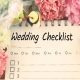 Image that resembles a note of Wedding Checklist that surrounded by a bunch of flowers.